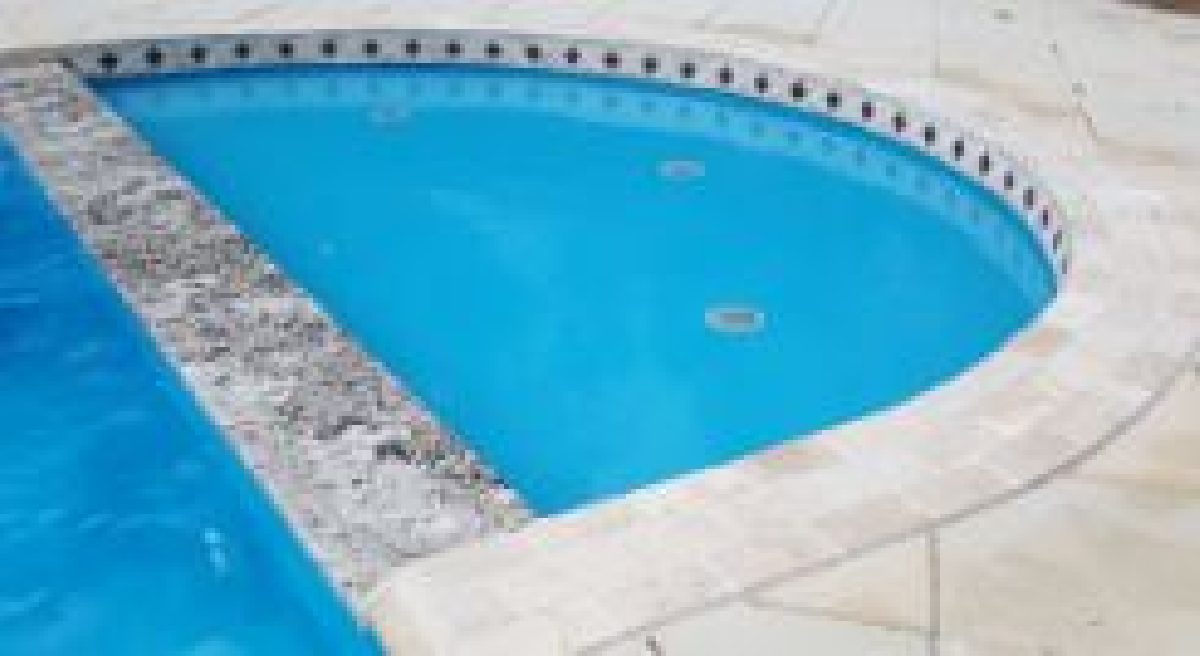 Round Spill Over Tanning Ledge pool photo
